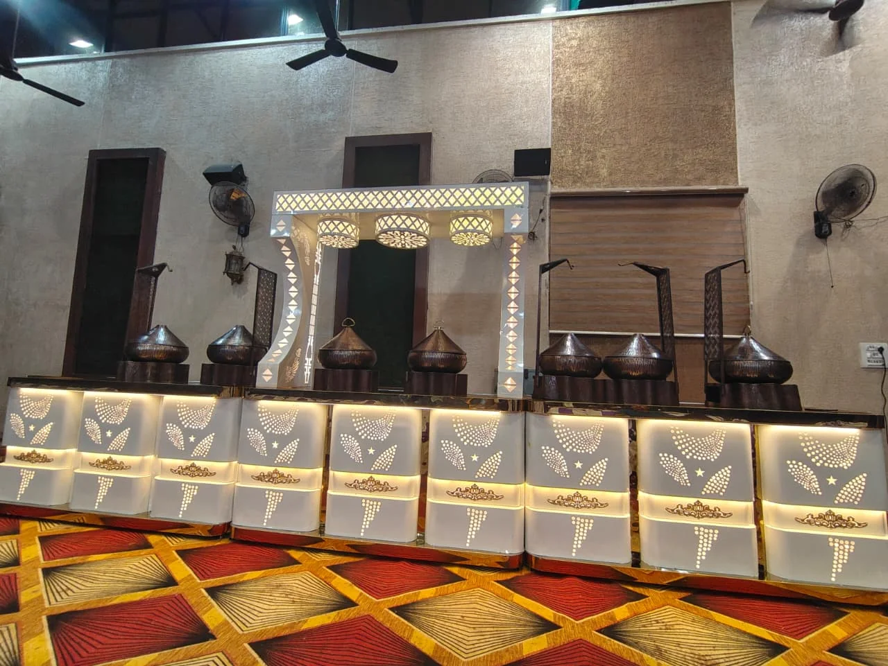 Ornate serving counter decorated for Shree Shabari catering